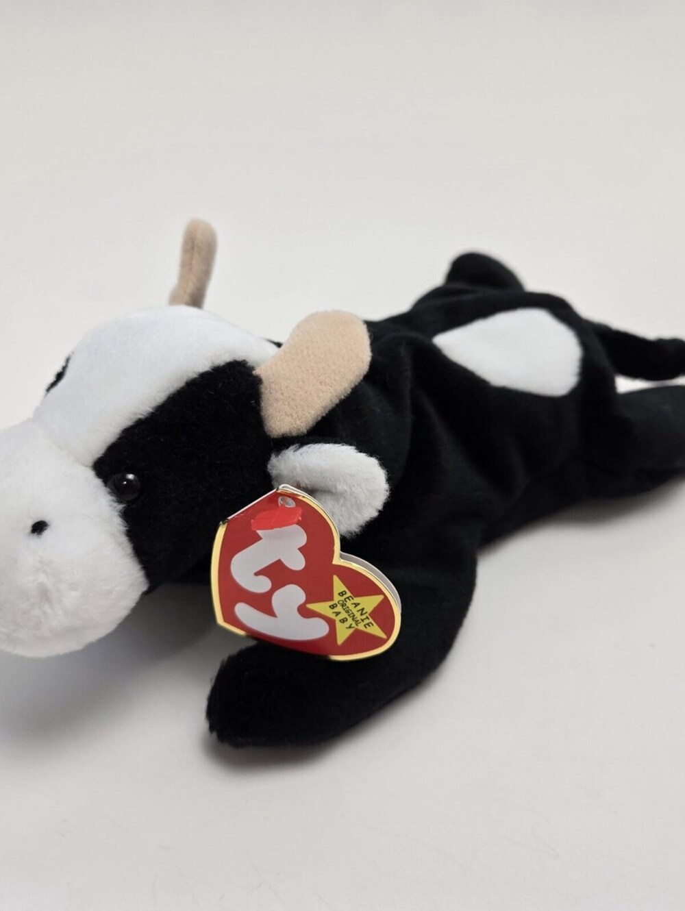Ty Beanie Baby “Daisy” the Cow Indonesia with Canadian Tush Tag (9 inch)